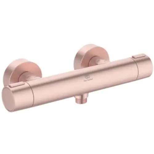 Brausethermostat in Roségold von Ideal Standard mit zwei runden Bedienelementen. Eignet sich für die Montage an der Wand.
